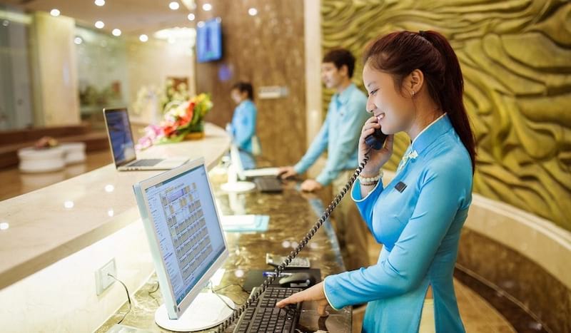 may đồng phục lễ tân áo dài