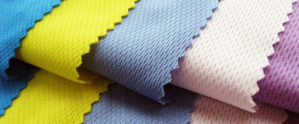 Nên chọn chất liệu vải thun đẹp, dễ thấm hút mồ hôi và giúp lên form dáng chuẩn